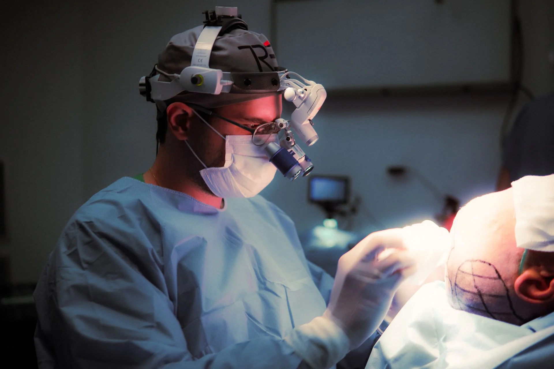 a doctor performing a hair transplant repair